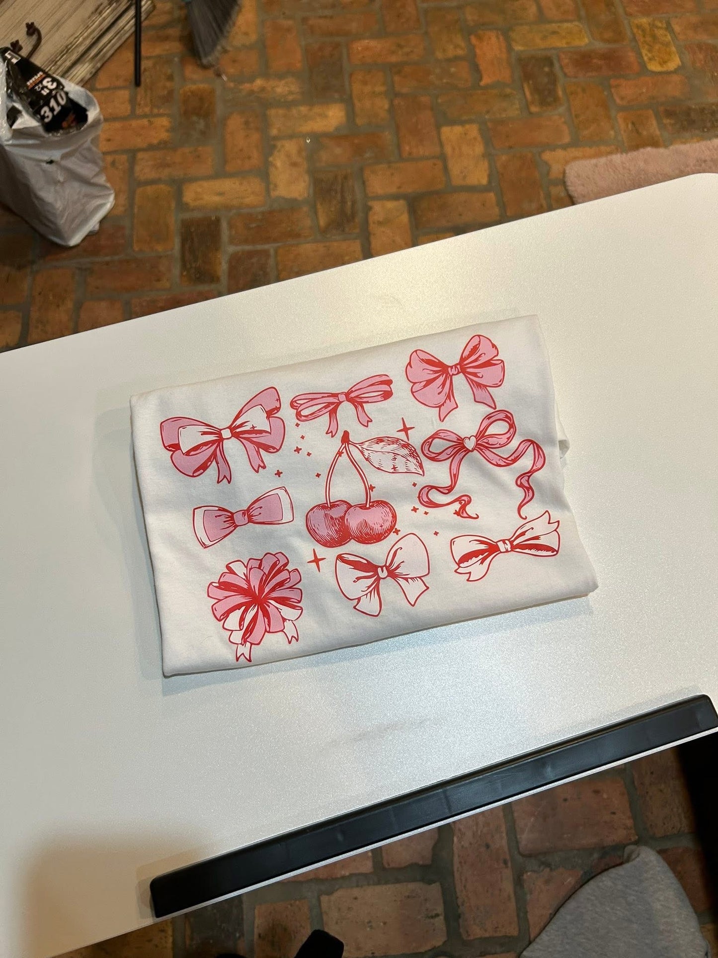 Cherries and bows graphic tee