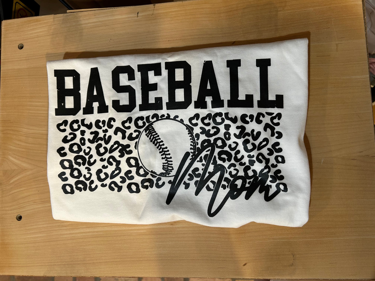 Leopard baseball mom