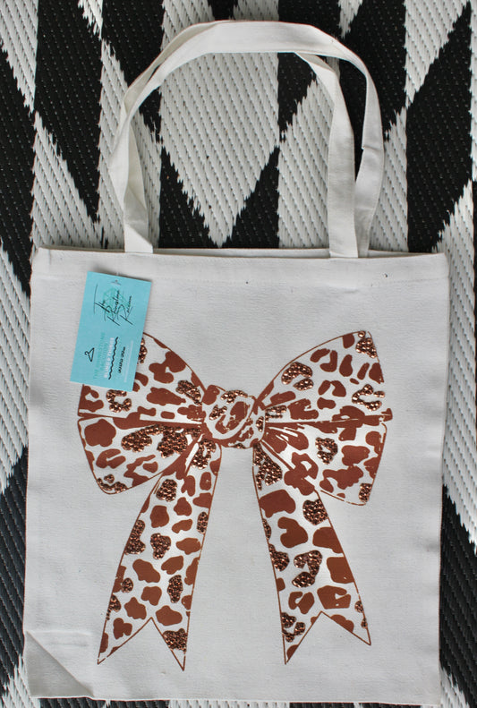 Cow print bow tote