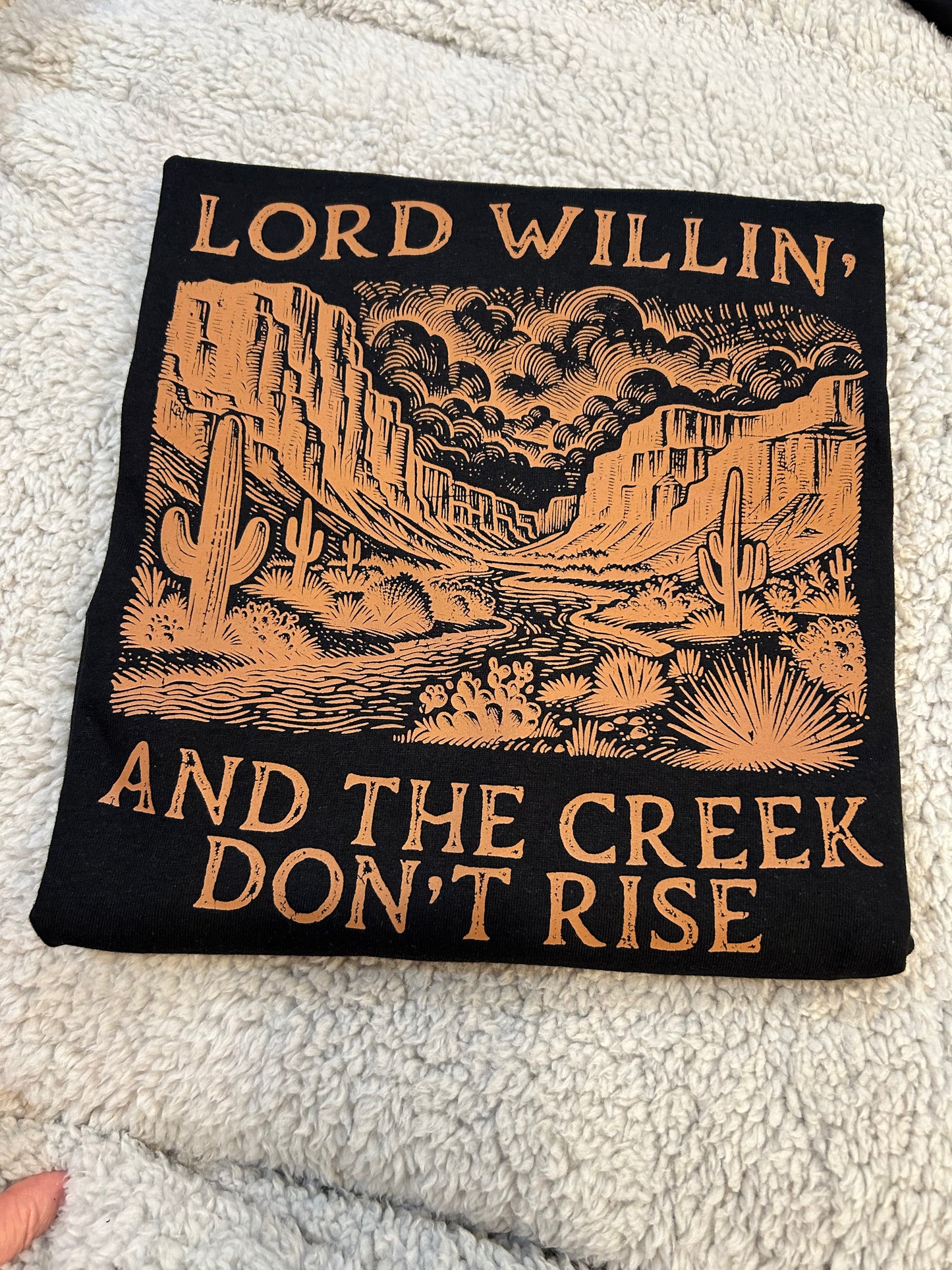 LORD WILLIN’ AND THE CREEK DON’T RISE GRAPHIC TEE